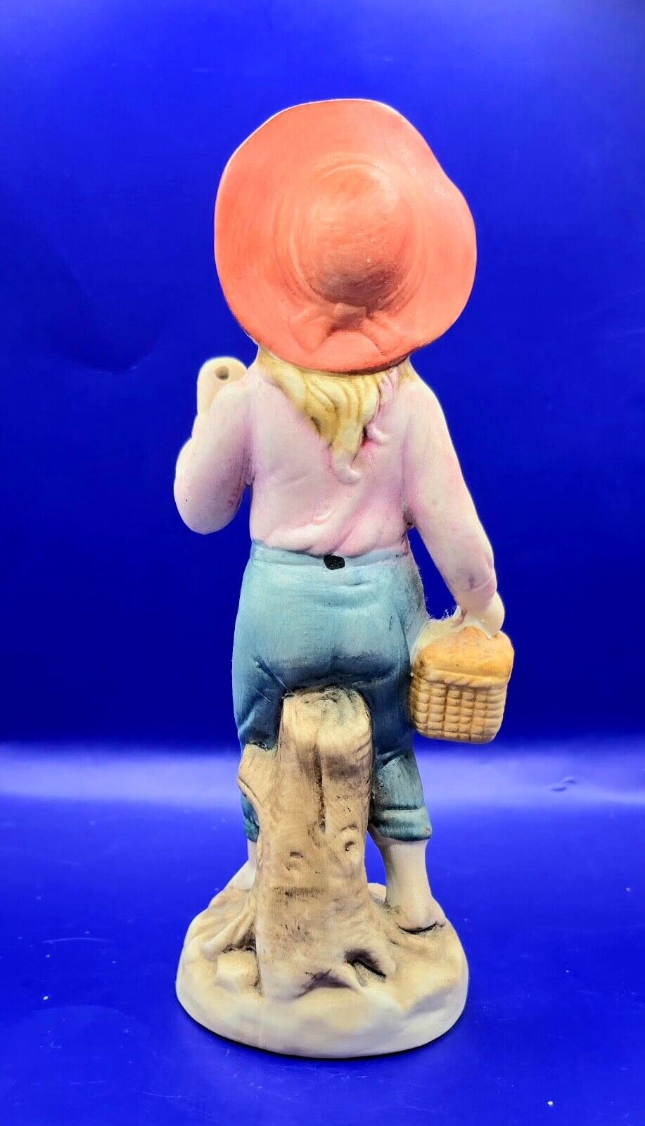 girl with basket figurine 7” tall