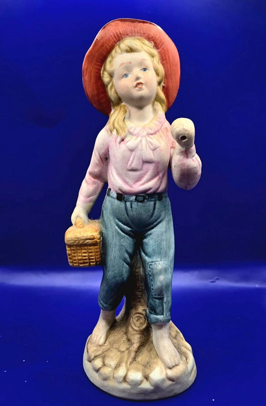 girl with basket figurine 7” tall