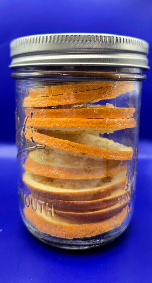 freeze dried orange slices in a 16oz wide mouth mason jar