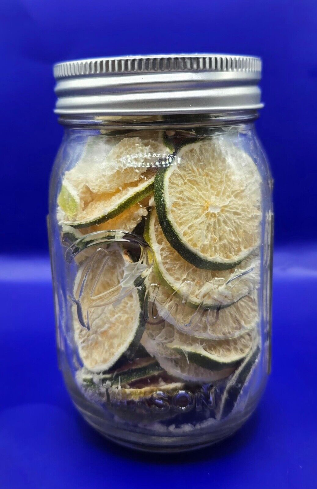 freeze dried lime slices in a 12oz mason jar