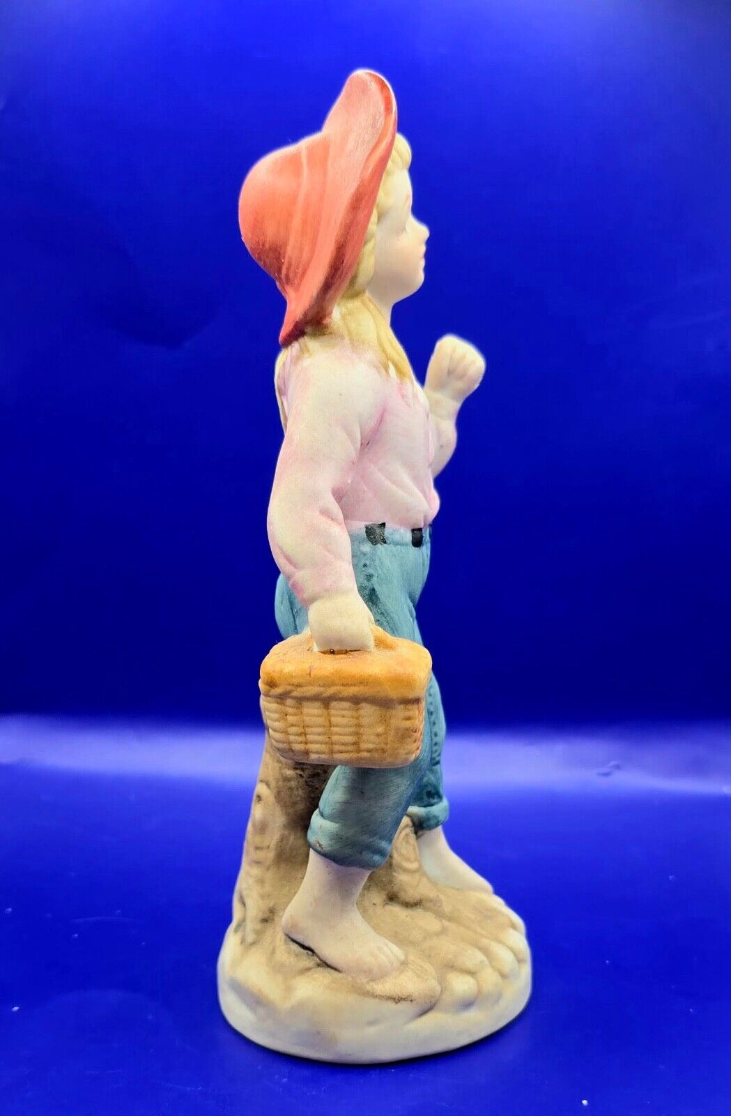 girl with basket figurine 7” tall